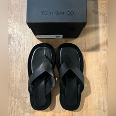 Tony Bianco Ives Slides, Brand New Never Worn Still Have Box Modern Black Flip Flops With Textured Footbed, Modern Black Toe Post Sandals, Modern Black Flip Flops With Cushioned Footbed, Modern Black Leather Flip Flops, Black Sandals With Textured Footbed And Single Toe Strap, Black Toe Post Flip Flops With Rubber Sole, Black Sandals With Textured Sole And Single Toe Strap, Modern Black Toe Post Flip Flops, Black Flip Flops With Leather Footbed