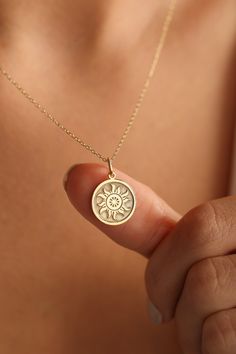 Gold Sun Pendant - Sun Gold Necklace ● Material of pendant: Solid Gold 14k ( REAL GOLD ) ● Metal Stamp: 14k ( REAL GOLD ) ● The pendant is available in 5 sizes: - 12,7 mm / 0.5 inches (Diameter) - 14,0 mm / 0,55 inches ( Diameter ) In the photos - 15,3 mm / 0.6 inches ( Diameter ) - 16,5 mm / 0,65 inches ( Diameter ) - 19,1 mm / 0,75 inches ( Diameter ) ( In the photos the size is 14mm / 0.55 inches Diameter ) ( Jump Ring inner diameter: 4 mm ) ● Material of chain: Solid gold 14k ( REAL GOLD ) I Spiritual 14k Gold Jewelry Stamped 14k, 14k Gold Flower Pendant Charm Necklace For Anniversary, 14k Gold Filled Yellow Gold Charm Necklace For Anniversary, 14k Gold Flower Pendant Jewelry Gift For Mom, 14k Gold Flower Pendant Necklace With Charms, Fine Jewelry Charm Necklace In Yellow Gold, Yellow Gold Medallion Jewelry As A Gift For Her, Fine Jewelry Yellow Gold Charm Necklace, Yellow Gold Flower Pendant Jewelry As Gift For Mom