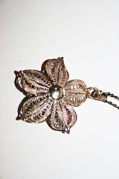 Vintage sterling silver filigree flower pendant necklace. Good condition, minor wear commensurate to age. Hallmarked on back. See photos for measurements. Vintage Silver Flower-shaped Necklace, Antique Necklaces With Large Flower Pendant, Vintage Silver Flower Shaped Necklace, Handmade Vintage Necklace With Flower Shape, Vintage Handmade Flower Shaped Necklaces, Vintage Handmade Flower Shape Necklaces, Handmade Vintage Flower Shape Necklaces, Vintage Handmade Flower Shaped Necklace, Vintage Sterling Silver Flower Pendant Necklace