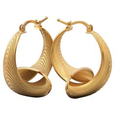 Elevate your style with our 24 mm Diameter Hoop Earrings in 18k Gold, a harmonious blend of Italian craftsmanship and modern innovation. These captivating earrings boast a striking fusion of classic beauty and futuristic design, handcrafted in Italy. Crafted with precision, these hoops feature a 24 mm diameter, framing your face with timeless elegance. What sets them apart is their innovative silhouette, effortlessly bridging the gap between contemporary and classic styles. Choose between 18k an Luxury Gold-plated Polished Hoop Earrings, Luxury Gold Plated Polished Hoop Earrings, Luxury Gold Plated Hoop Earrings With Polished Finish, Contemporary Yellow Gold Hoop Earrings For Formal Occasions, Modern Hallmarked Huggie Earrings, Yellow Gold Round Earrings With A Modern Twist, Modern Twist Yellow Gold Earrings With Polished Finish, Modern Twist Polished Yellow Gold Earrings, Modern Twist Yellow Gold Round Earrings