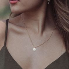 "The Syreni Necklace~  Syreni is Latin for mermaid //  Carry the sea with you wherever you go with our hand forged, water droplet necklace. - 14k gold fill or sterling silver droplet shape  - Hand stamped heart detail  - Simple cable chain, or for a little texture try our beaded chain  - 16\" or 18\" chain. If you would like a 2\" extender added, leave us a note at checkout  - 14k gold fill is nickel-free and suitable for sensitive skin  This piece layers perfectly with our bestselling AURORA ne Dainty Hammered Necklace, Dainty Teardrop Necklace For Everyday, Dainty Teardrop Drop Necklace For Everyday, Minimalist Water Drop Jewelry As Gift, Minimalist Water Drop Jewelry For Gifts, Minimalist Water Drop Jewelry Gift, Dainty Teardrop Charm Necklace, Delicate 14k Gold-filled Drop Jewelry, Delicate Drop-shaped 14k Gold Filled Jewelry