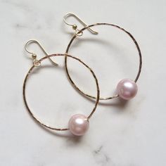 Gold Hoop Pearl Earrings~ These elegant gold hoop earrings with pink Edison pearls will look great for any occasion. Hammered and polished to a beautiful shine. Hoops are approx. 1.5" Model wearing similar designs Shop~ http://www.etsy.com/shop/HanaMauiCreations?ref=pr_shop_more International buyers please read our shipping policies before ordering~ POLICIES~ https://www.etsy.com/shop/HanaMauiCreations/policy?ref=shopinfo_policies_leftnav Nickel-free Small Hoop Earrings For Wedding, Pink Small Hoop Jewelry For Anniversary, Pink Sterling Silver Small Hoop Earrings, Nickel Free Small Hoop Earrings For Weddings, Pink Sterling Silver Hoop Earrings, Silver Hoop Jewelry For Celebration, Pink Nickel-free Dainty Hoop Earrings, Pink Dainty Nickel-free Hoop Earrings, Dainty Pink Nickel-free Hoop Earrings