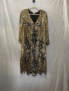 Vintage Chic Gold and Silver sequin dress on silk black lining, scalloped sleeves and scalloped bottom of dress, Disco fever, 80s retro by MaxiHausStudios on Etsy Vintage Embellished Long Sleeve Dresses, Retro Vintage Long Sleeve Dress For Party, Retro Long Sleeve Vintage Dress For Party, Vintage Holiday Evening Dresses, Vintage V-neck Party Dress, Retro Party Dress For Fall, Retro Fall Party Dress, Fall Party Retro Dress, Vintage Flapper Dress For Holiday Evenings