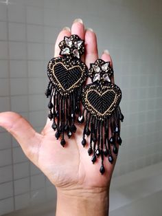 "Handmade black luxe heart fringes earrings. These statement handmade sparkling heart earrings are truly beautiful and ideal for parties and celebrations. Earrings measure about approx. 3.50\" long and 1.80\" wide. PS: Carnation jewelry is handmade & handcrafted in India hence there is a possibility of a slight or small imperfection due to the fact that these are made by hand. I still make sure that every piece made here is perfect to look at. For more details, please see our shop policies f Luxury Statement Beaded Earrings For Festive Occasions, Luxury Handmade Jewelry For Festive Occasion, Luxury Handmade Beaded Party Earrings, Luxury Handmade Beaded Earrings For Party, Luxury Handmade Party Beaded Earrings, Traditional Black Earrings, Luxury Handmade Beaded Earrings, Luxury Beaded Party Earrings, Luxury Beaded Earrings As Gift