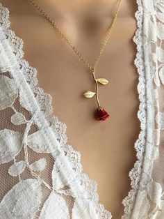 $17 - $34 · Original Red Rose Necklace, Beauty and the Beast Necklace,Anniversary Gift, Personalized Bridesmaid gift, Initial Necklace This dainty Long Stemmed Red Rose Necklace is plated in 24kt gold. Hand… Red Flower Charm Jewelry For Valentine's Day, Red Charm Necklaces For Mother's Day Gift, Rose Gold Flower Charm Necklace For Valentine's Day, Red Charm Necklace For Mother's Day Gift, Valentine's Day Rose Gold Flower Charm Necklace, Red Flower Pendant Jewelry For Valentine's Day, Rose Jewelry For Valentine's Day, Red Flower Pendant Jewelry For Mother's Day, Red Flower Pendant Necklace For Mother's Day