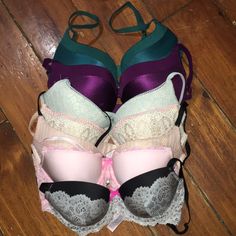 Assortment Of Bras Are In Good Used Condition. All Are In Preloved Condition But So Much Life Left! Please Ask Questions If You Have Any. Purple Bra Does Have Holes In The Front Lining Victoria's Secret Low-cut Bra For Night Out, Elegant Purple Victoria's Secret Bra, Blue Partially Lined Victoria's Secret Bra, Victoria's Secret Lavender Underwire Bra, Victoria's Secret Purple Bra With Built-in Bra, Purple Bras, 32d Bra, Victoria Secrets, Victoria Secret Bras