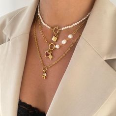 Our Allegra Necklace features a textured cable chain with O-ring to center with initial and mini freshwater pearl charms. Elegantly designed, this necklace makes a special personalised gift for a loved one or addition to your own collection. 18k gold plated stainless steel + freshwater pearls Length: 18" + 2" extender (can be made shorter, please leave desired length in 'order notes' section at checkout) Tarnish and sweat resistant Hypoallergenic no green skin 1 year warranty Trendy Gold Charm Necklace With Pearl Charm, Trendy Gold Charm Necklace With Pearl, Trendy Gold Charm Necklaces With Pearl Charm, Trendy Metal Pearl Necklace For Gift, Trendy Pearl Pendant Chain Necklace As Gift, Trendy Everyday Pearl Charm Necklaces, Trendy Chain Necklace With Pearl Pendant For Gift, Trendy Everyday Pearl Charm Necklace, Trendy Gold Pearl Charm Necklaces