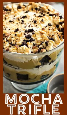 a close up of a dessert in a bowl with the words mocha trifle on it