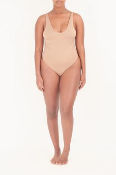 Bonita Bodysuit – Driftwood Maui & Home By Driftwood #nude #taupe #neutrals #bodywear #bodysuits #onepieces #swimwear #bathingsuits #retro #90sstyle #chic #mai #driftwoodmaui #maui #hawaii #shopsmall Fitted Backless Swimwear With Built-in Bra, Solid Swimwear With Built-in Bra, One-piece Swimwear With Built-in Bra And Stretch, Contoured Swimwear With Built-in Bra For Poolside, Seamless Bodysuit For Sunbathing, Backless Swimwear For The Beach, Seamless One-piece Beachwear Bodysuit, Seamless Beachwear Bodysuit For Sunbathing, Smoothing Underwire Swimwear For Beach