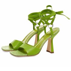 By Far Presents These Sleek, Stylish Sandals Which Arrive In A Bright Green Hue. Featuring A Small Heel, They Are Crafted From Durable Cowhide Leather And The Sole Features Croc-Print Detailing As A Completion To The Retro Look. Wrap Detailing, Made In Portugal. Note Box Is Damaged Sh/40 Evening Sandals With Single Toe Strap In Green, Evening Green Sandals With Single Toe Strap, Green Leather Heels With Reinforced Heel, Green Evening Sandals With Wrapped Heel, Green Lace-up Sandals With Wrapped Heel, Green Heel Strap Sandals For Evening, Green Evening Sandals With Heel Strap, Evening Green Sandals With Heel Strap, Chic Green High Heel Lace-up Sandals