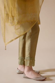 Yellow kurta with floral motifs and bead work details. Paired with a viscose silk pant, organza dupatta and silk shantoon slip. - Aza Fashions Yellow Kurta, Silk Pant, Women Kurta, Straight Kurta, Organza Dupatta, Kurta With Pants, Silk Pants, Set Women, Floral Motifs