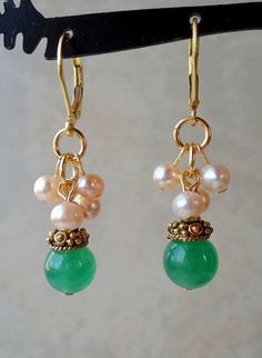 Green Jade Cluster Earring.Freshwater Pearls.Bead Cap plate in 24k Gold.Dangle.Drop.Pastel.Bridal.Mo Gold Jade Wedding Earrings, Green Round Pearl Drop Jewelry, Elegant Green Earrings With Natural Stones, Handmade Jade Jewelry For Weddings, Elegant Jade Earrings For May Birthstone, Elegant Green Jade Jewelry, Green Dangle Pearl Earrings For Pierced Ears, Green Jade Earrings For May Birthstone, Green Pearl Earrings For Anniversary