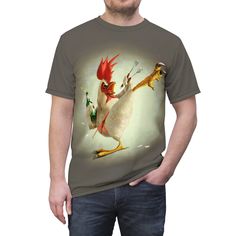 This Kung Fu Rooster tee was created to be a versatile and stylish companion for all your casual appearances. With its uniquely textured, thick, microfiber-knit fabric, this t-shirt bears a premium, soft feel that remains lightweight and highly breathable - the perfect combo for a hot day or layering. .: 100% Polyester .: Light fabric ((6.0 oz/yd² (170 g/m .: Regular fit .: Tagless .: Runs true to size .: Assembled in the USA from globally sourced parts Fitted Novelty Tops With Graphic Print, Novelty Cotton Tops With Sublimation Print, Novelty Cotton Top With Sublimation Print, Funny Sublimation Print Crew Neck Top, Novelty Tops With Funny Print And Relaxed Fit, Fitted Crew Neck Fun T-shirt, Novelty Tops With Funny Print And Crew Neck, Novelty Short Sleeve Tops With Funny Print, Novelty Short Sleeve Top With Graphic Print