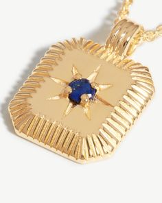 Star Ridge Birthstone Pendant Necklace | 18k Gold Vermeil/Lapis Lapis/September. Bring Your Birth Month a Whole New Meaning with a Personalized Gemstone Necklace. The Ridged Pendant, Held on a Short Chain Necklace, Holds a Natural Lapis Stone, Symbolizing Strength and Courage, and is Embellished with a Central Star Motif. The Perfect Gift for Anyone Born in September. Please Note: Engraving Items May Take 2 Working Days to Process. Metal: 18K Recycled Gold Plated Vermeil on Recycled Sterling Sil Sapphire Gemstone Jewelry With Rectangular Pendant, Luxury Gold Plated Jewelry With Rectangular Pendant, Luxury Gold Plated Rectangular Pendant Jewelry, Gold Celestial Jewelry With Rectangular Pendant, Celestial Gold Jewelry With Rectangular Pendant, Yellow Gold Plated Square Pendant Jewelry, Gold-plated Yellow Gold Square Pendant Jewelry, Celestial Gold Gemstone Jewelry, Gold Gemstone Necklace With Recycled Gold