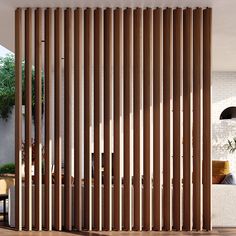 an open room with wooden slats on the wall