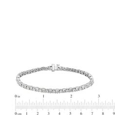 Make your grand entrance wearing this dazzling trillion-cut lab-created diamond tennis bracelet. 14K white gold Features an endless row of 1/10 ct. trillion-cut certified lab-created diamonds in an alternating pattern F color/VS2 clarity Includes certification card 5-1/2 cts. t.w. of lab-created diamonds 7.0-inch bracelet; box clasp Bracelet Box, Diamond Tennis Bracelet, Box Clasp, Grand Entrance, Tennis Bracelet Diamond, Lab Created Diamonds, Tennis Bracelet, Entrance, Tennis