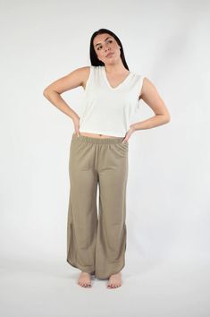 The chicest pair of lounge pants around! Our Casey lounge pants take your loungewear to the next level. Soft, comfortable, and so easy to style - everyone needs a pair of these. The lounge pants are comfy and cute making the perfect casual outfits. Features: Curve Hem Elastic Waist Model is wearing a medium. Height 5'8", Bust 35", Waist 28.5", Hip 34.5" Fabric content: 45% Nylon : 55% Rayon Relaxed Harem Pants With Elastic Waistband For Loungewear, Wide Leg Stretch Harem Pants For Leisure, Stretch Wide Leg Harem Pants For Leisure, Comfortable Casual Bottoms For Relaxation, Comfortable Wide Leg Harem Pants For Loungewear, Comfortable Wide-leg Harem Pants For Loungewear, Versatile Loose Fit Harem Pants For Loungewear, Comfortable Spring Pants For Relaxation, Comfortable Pants For Relaxation And Spring