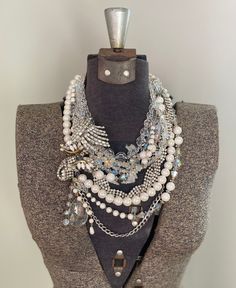 * This is a CUSTOM ORDER, please allow 2-3 weeks for creation! I will be in contact with you the entire time as you choose what specialized rhinestone pieces you want in your unique statement piece made just for you. * How stunning is this ivory white pearl and crystal necklace?!  There are a ton of sparkles in this lovely ensemble!  Repurposed rhinestone pieces dating from the 1940s-60s are used throughout the piece to give it a unique sparkle unlike rhinestone pieces created today.  The vintag Costume Jewelry Necklace With Bling, Wedding Necklaces With Rhinestones, Evening Diamond Jeweled Necklaces, Opulent Silver Jeweled Jewelry, White Rhinestone Jewelry For Jewelry Making, Bridal Costume Jewelry Necklace With Bling, Unique Party Jewelry With Bling, Unique Crystal Jewelry With Rhinestones, Gift Jeweled Necklaces