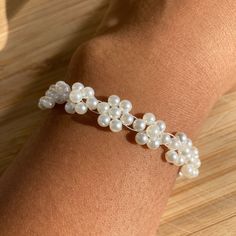 🤍Welcome to my shop🤍 This white bracelet, will make the perfect gift for your loved ones. 😊 🤍Materials🧵: -Nylon thread                              -Pearl beads                              -Stainless steel lobster clasp and jump rings 🤍Features: Made out of very high quality materials. Doesn't tarnish easily/doesn't turn skin "green"; adjustable. Very resilient to various environments, inc. water, humidity, etc. Materials come from environmental-friendly sources. Can be worn everyday, and White Delicate Adjustable Friendship Bracelets, Delicate White Adjustable Friendship Bracelets, Handmade Dainty Pearl White Bracelets, Delicate Adjustable White Friendship Bracelets, Handmade Adjustable Pearl Bracelet For Wedding, Adjustable Hand Wrapped Bracelets For Wedding, Adjustable White Crystal Bracelet Gift, Adjustable White Beaded Pearl Bracelet, White Delicate Beaded Bracelet