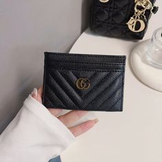 Introducing the epitome of sophistication and style: the Classic GG Wallet Card Holder - Luxury Edition. Crafted with meticulous attention to detail and unparalleled craftsmanship, this accessory seamlessly merges timeless elegance with modern functionality. Made from the finest quality materials, the Classic GG Wallet exudes luxury at every touch. Its iconic GG monogram pattern embossed on premium leather not only showcases impeccable taste but also speaks volumes about your discerning eye for Double G Logo, Leather Card Holder Wallet, Chic Quilts, G Logo, Gg Monogram, Monogram Pattern, Logo Set, Wallet Card, Everyday Accessories