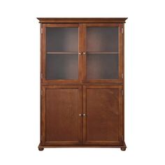 a wooden bookcase with glass doors on the front and bottom shelves, against a white background