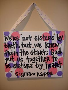 a sign that says, we're not sisters by birth but we knew from the start god put us together to be sisters by heart