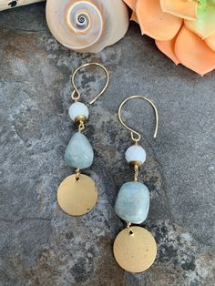 Beachy boho style earrings .. crafted with hand forged ear wires .. faceted White Buffalo Turquoise and tumbled Aquamarine accented with brass coin charms .Thus fun pair measure 3.5 inches in length. Bohemian Dangle Earrings For Beach, Bohemian Shell Earrings For Beach Season, Bohemian Hammered Dangle Earrings, Bohemian Jade Earrings With Ear Wire, Bohemian Amazonite Earrings As Gift, Bohemian Jade Dangle Jewelry, Beachy Boho Outfits, Bohemian Dangle Jade Jewelry, Bohemian Amazonite Earrings For Gifts