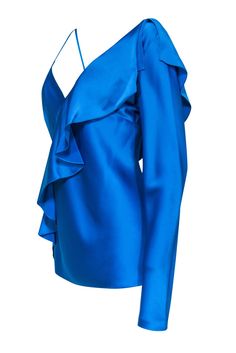 Transform into the ultimate disco darling with this flashy Diane von Furstenberg blouse! Made in a bright and bold blue hue and chic one-sleeved design on oh-so-soft satin, this ruffled beauty is perfect for a posh party look with a '70s twist! Pair with bell bottoms and platform pumps and you'll be doing the Hustle in no time! Size 14 86% Triacetate, 14% Polyester Pullover Unlined V-neckline One long sleeve on left side Ruffled flounce on front and back Bust 40" Waist 37" Sleeve length 27.5" Sh Chic Long Sleeve Cocktail Top, Fall Cocktail Long Sleeve Blouse, Elegant Blue Blouse For Party, Blue V-neck Blouse For Evening, Glamorous Formal Tops With Ruffles, Blue V-neck Blouse For Party, Blue Blouse For Night Out In Fall, Blue Fitted Blouse For Evening, Chic Blue Evening Top