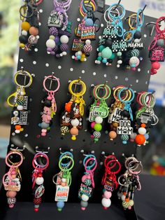 there are many different key chains on display