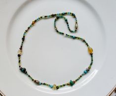 citrine turquoise seed bead artisan necklace 17.5 inches Long Beaded Necklaces With Natural Stones For Gifts, Bohemian Czech Glass Jewelry With Oval Beads, Green Oval Gemstone Beads Jewelry, Elegant Single Strand Turquoise Jewelry, Elegant Turquoise Single Strand Jewelry, Beaded Czech Glass Round Necklace, Single Strand Czech Glass Necklaces With Round Beads, Unique Adjustable Gemstone Bead Necklace, Single Strand Czech Glass Necklace With Round Beads