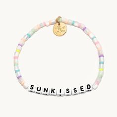 A sunkissed beach days bracelet from Little Words Project. Cheap Beach Charm Bracelet With Round Beads, Cheap Beaded Bracelets For Beach Party Season, Cheap Letter Beads Bracelets For Beach Season, Beach Words, Heishi Bracelets, Beachy Bracelets, Acrylic Bracelet, Wrist Stacks, Bracelet Inspo