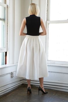 A solid woven full skirt with side zipper closureDetails:Self : 100% PolyesterSize & Fit- Model is 5`9" And Wearing Size Small- Measurements Taken From Size Small- Approx. Length: 35" Daywear A-line Lined Skirt, Chic Cotton A-line Pleated Skirt, Chic White A-line Pleated Skirt, White Relaxed A-line Skirt, White A-line Lined Skirt, White A-line Gathered Skirt, White Pleated A-line Skirt, White Fitted A-line Bottoms, White Flowy A-line Skirt