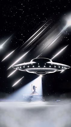 an image of a man sitting in front of a flying saucer with lights on it