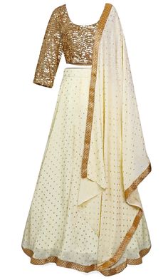 The lehenga skirt is crème in color, and the long-sleeve blouse is completely covered in gold sequins. Polka Dots Blouse, Mens Indian Wear, Western Wear Dresses, Leo Season, Lehenga Skirt, Gold Polka Dots, Saree Dress, Cute Crop Tops, In The Room