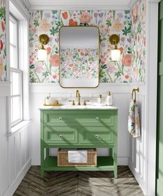 a bathroom with a green vanity and floral wallpaper