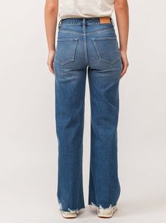 These high-rise wide leg jeans are a must-have! With a cozy fit at your natural waist, they highlight your curves and hips beautifully. Made from comfy stretch denim, they feature fun details like hand-sanded hip whiskers, pocket grinding, and stylish frayed edges. Fit is slightly snug, give sometime to ease in, or may go up one size. Model is wearing a size 27. Lake Life Decor, Fall Linen, High Rise Wide Leg Jeans, Dear John, Capri Blue, Cozy Fits, Light Sweater, Latest Outfits, Wide Leg Denim