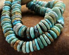 Gorgeous turquoise worthy of an enthusiastic 'add to cart'. Turquoise graduated discs are a dreamy, natural mix of turquoise and neutral hues. Boho beautiful, classic nature-inspired, and simple & modern - the sky is the limit for possible design styles! Create a luxe turquoise masterpiece with the whole strand, feature individual beads in minimalist looks, or use 3-7 beads at a time for stunning bead link features. Please see additional images for examples of variance. Hubei Turquoise is some o Cheap Polished Turquoise Beads, Cheap Turquoise Beads For Gifts, Cheap Turquoise Beads With Large Beads, Cheap Bohemian Turquoise Beads, Luxury Unique Turquoise Beads, Affordable Turquoise Gemstone Beads Jewelry, Luxury Turquoise Jewelry With Polished Beads, Cheap Turquoise Round Beaded Jewelry, Cheap Polished Turquoise Beads Jewelry