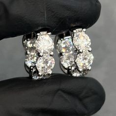 Stunning oversized 8 carat hoops made with 6mm (0.80 carat) prong set stones. Moissanite offers timeless beauty and exceptional value. This is the best compromise between cheap fakes (CZ, crystal, rhinestone) and extremely expensive diamond studs. Natural diamond equivalent hoops cost $8000+. Get the same look at a reasonable price. Order yours today! -VVS1 Clarity D color GRA certified Moissanite Stones -Hearts and Arrows Pattern Ideal Cut, Excellent Rating.  -More Fire and Brilliance than Cheap Priced Moissanite online -9.5 Hardness Rating (will not dull/scratch easily). Diamonds are perfect 10, most fake stones are 3-4.  -Choose Sterling Silver (Rhodium or Gold Plated) -Passes many Thermal Diamond Testers -Comes with inner/outer box with GRA certificate Handwritten Necklace, Aquarius Jewelry, Running Jewelry, Dna Jewelry, Earrings Huggies, Expensive Diamond, Handwriting Necklace, Signature Bracelet, Handwriting Jewelry