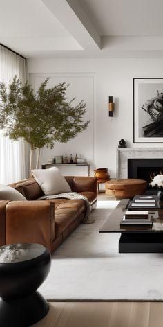 a living room filled with furniture and a fire place in front of a painting on the wall