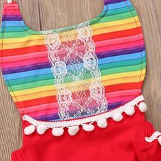 This rainbow romper is a must-have for those hot summer days! Rainbow Romper, Bubble Romper, Hot Summer, Summer Days, Must Haves, Bubbles, Rompers, Rainbow, Throw Pillows