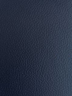 an up close view of a blue leather texture