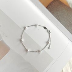 If you are interested in placing a bulk order (50+ pieces), please message us for special pricing.--Dainty pearl bracelet, gold pearl bracelet, minimalist chain bracelet, 925 sterling silver bracelet, pearl jewelry, bridesmaid gifts-- ► DETAILS  -925 sterling silver + white gold/14k gold -pearls -Length: 6 inches + 2 inches chain extender ►Heavenly Materials Our jewellery pieces are delicately handcrafted with gold-fill, sterling silver, stainless steel and gold-plating, combining rich, warm ton Minimalist Sterling Silver Pearl Bracelet, Elegant Sterling Silver Bracelet With Delicate Chain, Dainty Sterling Silver Bracelets With Pearl Charm, Sterling Silver Pearl Chain Bracelet, Sterling Silver Pearl Bracelet As Gift, Silver Dainty Pearl Bracelet As Gift, Elegant Sterling Silver Pearl Bracelet As Gift, Dainty Silver Pearl Bracelet Gift, Everyday Delicate Sterling Silver Pearl Bracelet