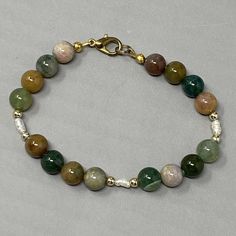 Multi Color Gemstone Bracelet Polished Round Beads Green Brown Healing Chakra Creative Drawing Prompts, Drawing Prompt, Creative Drawing, Green Bead, Jewelry Inspo, Gemstone Bracelet, Green And Brown, Round Beads, Chakra