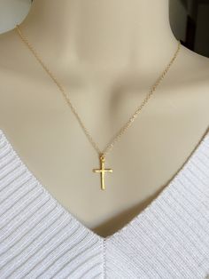 "Handmade with love! Delicate Cross necklace is great gift ideas for Mom, for your wife, for birthday, for Baptism, Christmas, Mother's day, gift for her, for mom, grandma, best friend, sister, daughter, bridesmaid gift.... MATERIALS: - Silver Plated chain and components. - Sterling silver Cross size 11.6mm x 20.6mm. - The model is wearing a 18\" inches necklace from end to end. - Gold Plated chain and components. - Gold Plated Cross. HOW TO ORDER: ** Please click on the drop down menu select ne Personalized Cross Pendant Necklaces For Birthdays, Cross Necklace For Mother's Day Gift, Cross Necklaces For Birthday And Mother's Day, Dainty Cross Necklaces For Mother's Day, Cross Necklace For Birthday And Mother's Day, Dainty Cross Necklace For Mother's Day, Personalized Cross Necklace For Mother's Day, Mother's Day Gift Cross Pendant Necklace, Personalized Cross Charm Necklace For Gift