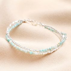 Silver Dainty Beaded Bracelets, Dainty Silver Friendship Bracelets With Round Beads, Double Strand Tiny Beads Bracelet As Gift, Double Strand Tiny Beads Bracelet For Gift, Delicate Silver Beaded Bracelet With Round Beads, Casual Light Blue Beaded Bracelets, Double Strand Beaded Bracelet As Gift, Silver Double Strand Beaded Bracelet, Double Strand Faceted Beads Bracelet For Gift