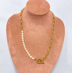 This versatile piece combines edgy style with sophistication, featuring a chunky textured chain and 14 freshwater pearls. The 19-inch length offers endless styling options, while the heart-shaped toggle clasp adds a sweet touch. Elevate any outfit with this bold and elegant necklace. Hypoallergenic (Lead and nickel free) Material: Stainless Steel, Freshwater Pearls Length: 19" (48cm) Hardware: Heart Toggle clasp Edgy Style, Elegant Necklace, Elegant Necklaces, Toggle Clasp, Edgy Fashion, Fresh Water, Freshwater Pearls, Heart Shapes, Pearl Necklace