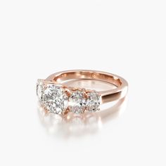 three stone diamond ring in yellow gold