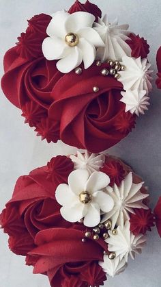 two red and white flower bouquets with pearls on the top one is made out of fabric