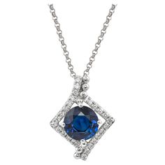 This collection features a dainty selection of jewelry with blue sapphires and diamonds. These Blue Sapphires are sourced from Madagascar and project a bold blue hue. Accented with diamonds, these minimal pieces can be the perfect accessory to your everyday outfit. Blue Sapphire: 1.28 carat round shape, 6mm size. Diamonds: 0.105 carat, G colour, VS clarity. Gold: 3.52g, 18K white gold. Chain Length: 17.5 inches. P120 Luxury Blue Diamond Necklace For Anniversary, Elegant Blue Diamond Pendant Necklace, Blue Luxury Diamond Necklace For Anniversary, Dazzling Blue Necklace With Brilliant Cut, Formal Blue Diamond Gemstone Necklace, Formal Blue Gemstone Diamond Necklace, Blue Sapphire Jewelry With Single-cut Diamonds, Blue Sapphire Jewelry With Single Cut Diamonds, White Gold Jewelry With Diamond Cut Lab-created Sapphire