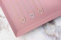 "\"Your heart is like a diamond. It's sparkling, strong and beautiful. Always treat yourself with love. Your heart deserves it... It is priceless!\" --Fairy Goldcharm Check out some layering options! https://www.etsy.com/listing/509323081/curved-bar-necklace-gold-bar-necklace?ref=shop_home_active_81 https://www.etsy.com/listing/513878526/diamond-gold-bar-14k-gold-necklace?ref=shop_home_active_1 Matching hearts! https://www.etsy.com/listing/507309406/tiny-heart-earrings-14k-gold-earrings?ref=shop Gold Engraved Necklace, Dressy Jewelry, Necklace Diamond Pendant, Gold Necklace Diamond, Tiny Heart Earrings, Mangal Sutra, Diamond Heart Necklace, Necklace White Gold, Diamond Heart Pendant Necklace